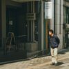A man walks in front of a K-pop themed building in downtown Seoul, South Korea.