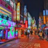 Explore the vibrant nightlife of Seoul's bustling street with colorful neon signs and lively atmosphere.