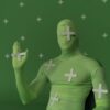 Person wearing a green screen suit with tracking markers for visual effects work.