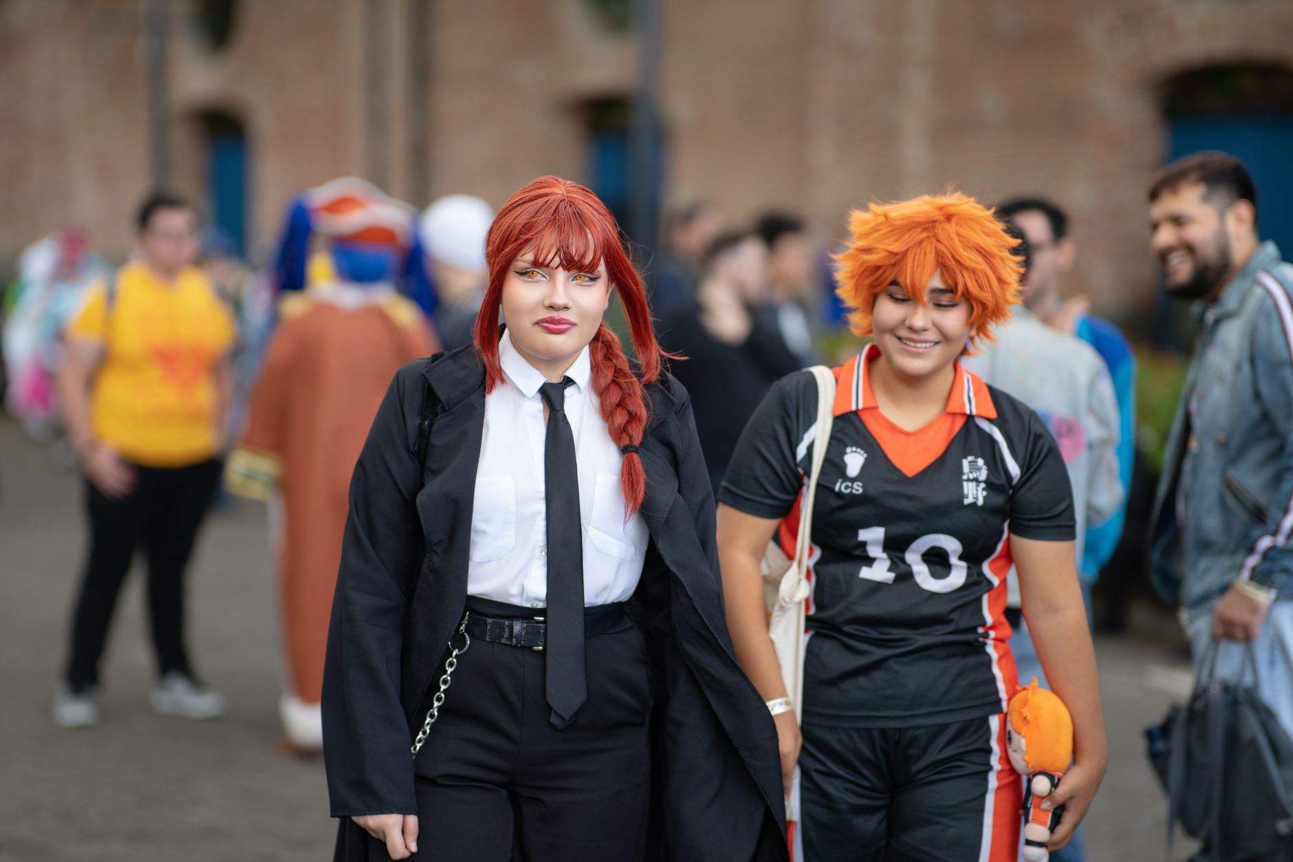 Colorful anime cosplay gathering outdoors in San José, Costa Rica.