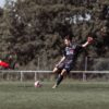 Dynamic soccer match action featuring players in France, showcasing athleticism and competition.