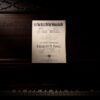 Antique sheet music on a vintage piano. Perfect for classic music lovers.